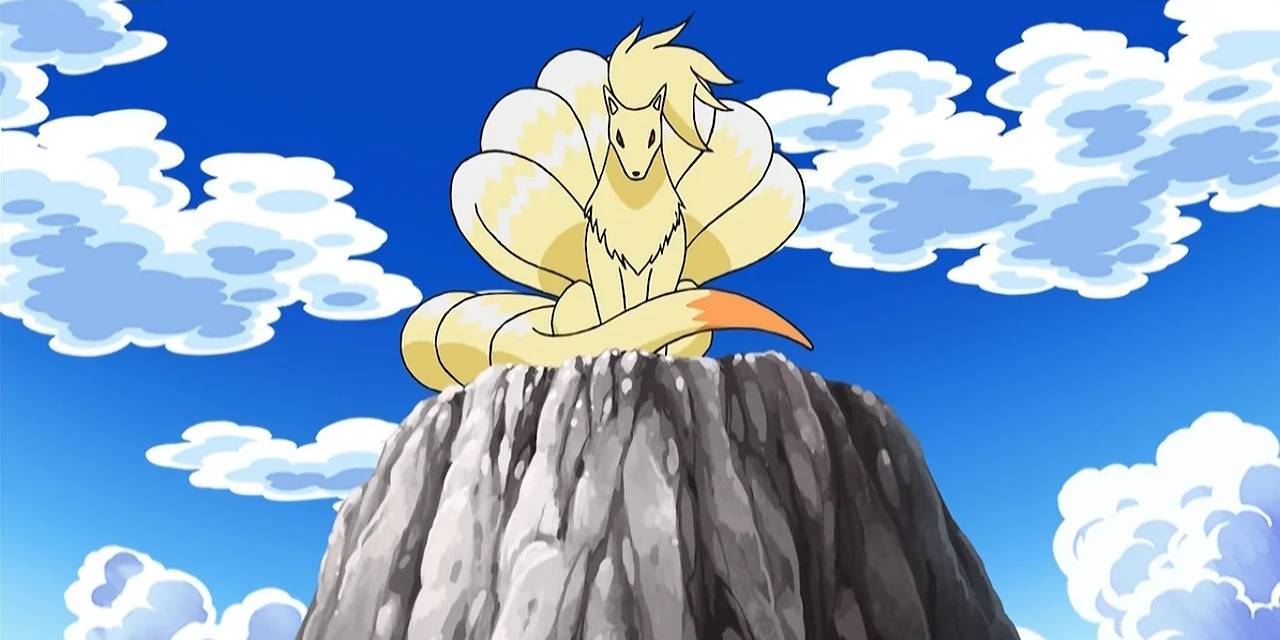 15 Pokémon do tipo Fire mais fortes: Charizard lidera Ninetales sits atop a mountain looking down in the Pokemon anime.