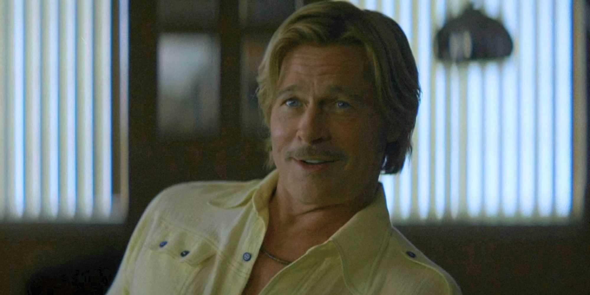 Cliff Booth (Brad Pitt) smiling in The Adventures of Cliff Booth