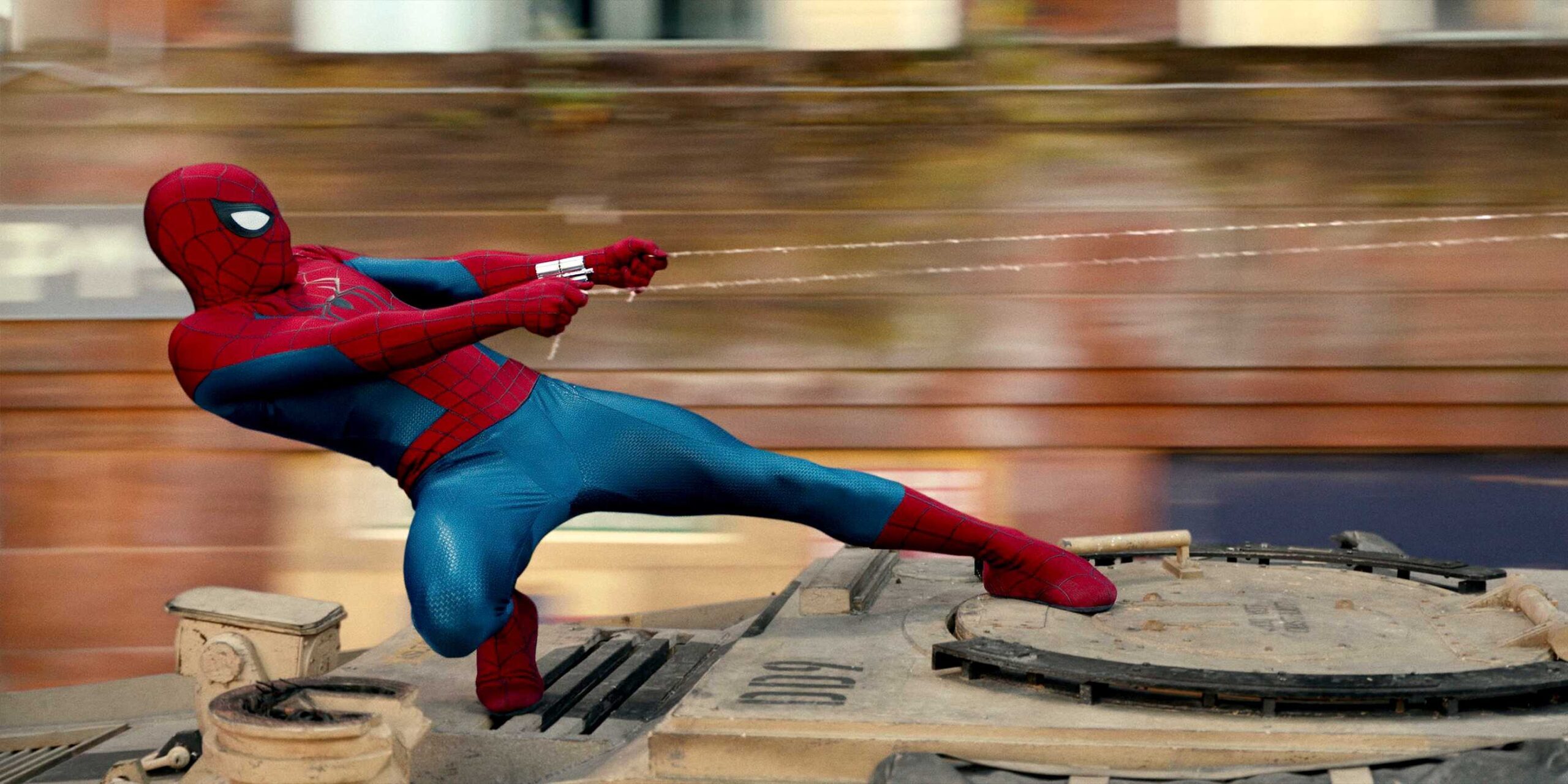 Spider-Man pulling something with his web in Spider-Man: Brand New Day