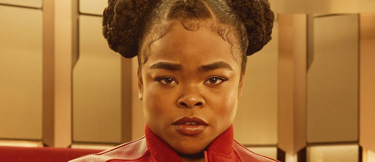 Kerrice Brooks em evento de Star Trek: Starfleet Academy, destacando a atriz em painel promocional da série